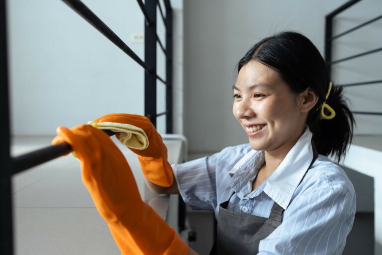 hands-in-blue-rubber-gloves-holding-microfiber-cle-2025-02-18-03-30-14-utc