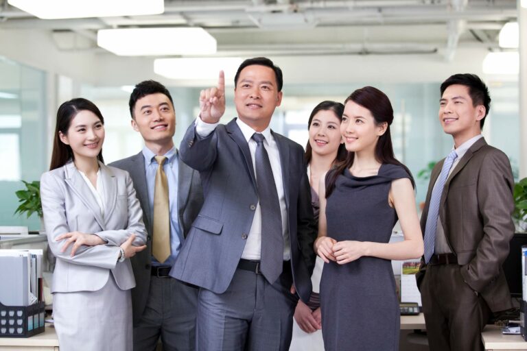 happy-businesspeople-pressing-on-a-virtual-screen-2024-10-18-06-15-19-utc