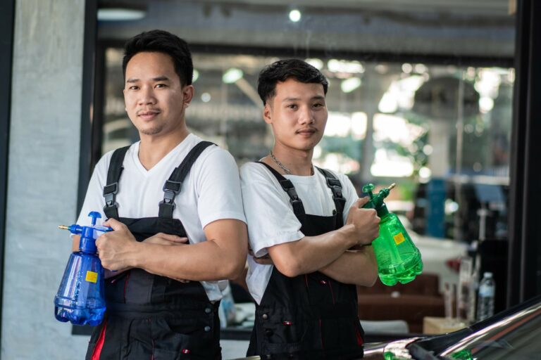 portrait-of-asian-mechanic-worker-standing-and-hol-2023-11-27-05-03-19-utc